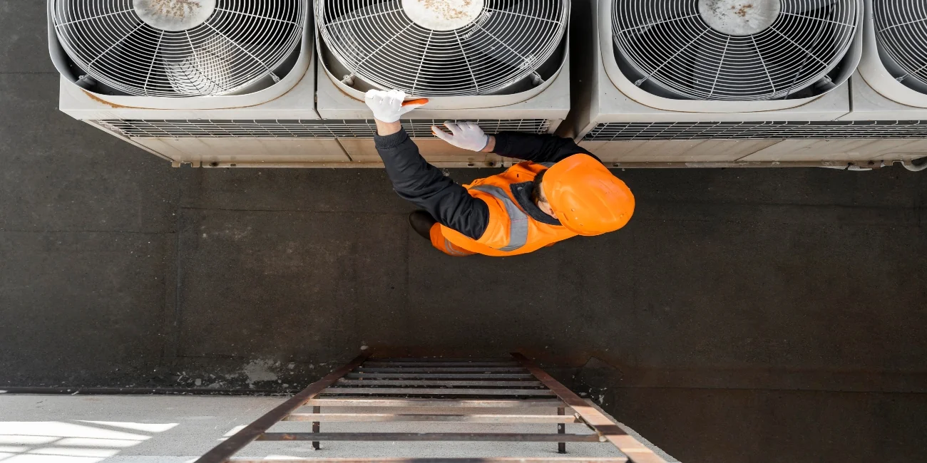 AC repair technician in a Downtown Dubai residential tower