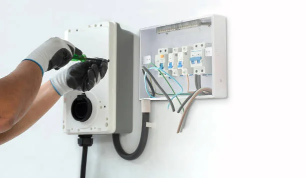 Electrician upgrading a distribution board in Dubai