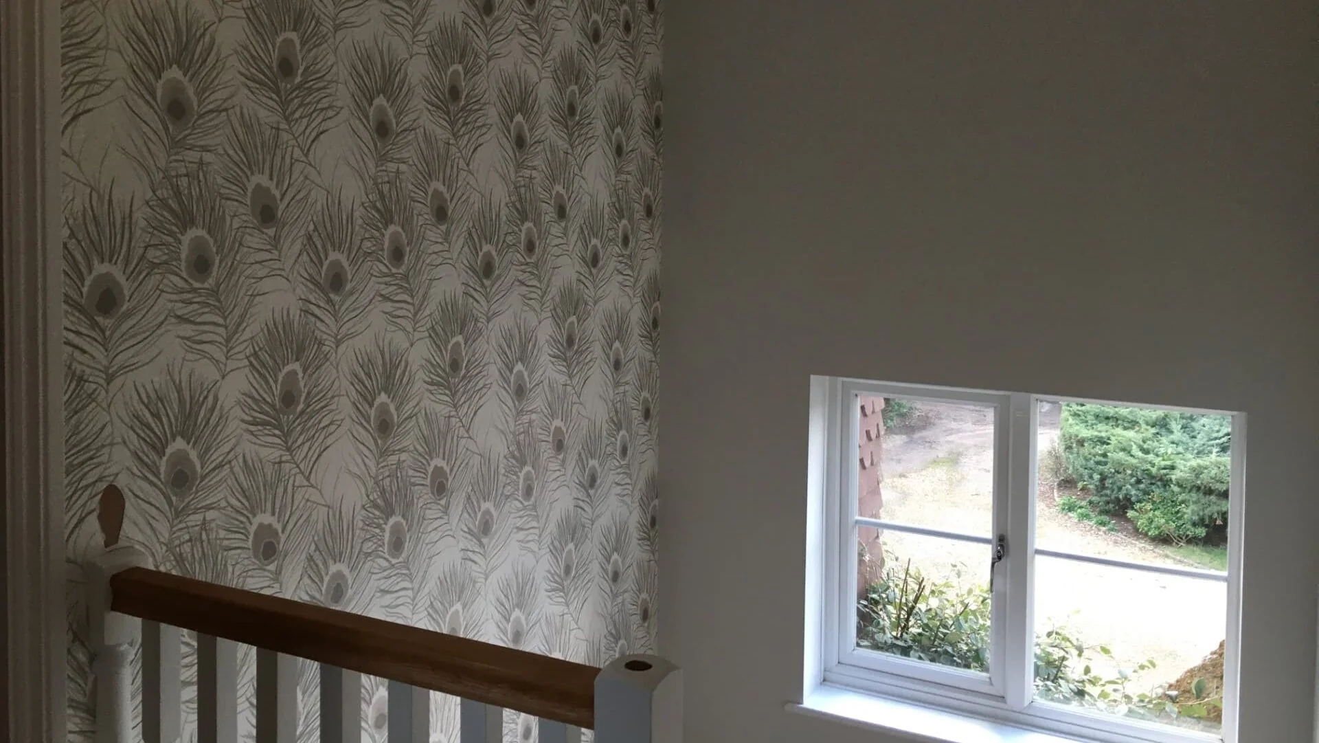 Modern bedroom with custom wallpaper